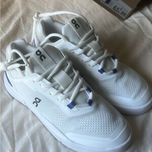 On Running White Sneakers with Blue Accents